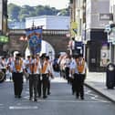 Orangemen take part in the July 12 celebrations in Derry’s city centre on Saturday morning. Photo: George Sweeney