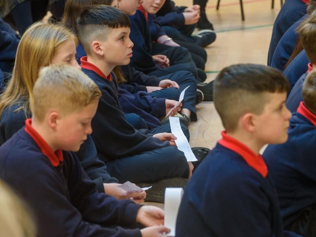 The Mayor, Councillor Sandra Duffy paid a visit to St Oliver Plunkett PS in Strathfoyle as part of Derry City and Strabane District Council’s  Local Democracy Week where she was joined by Councillor Rachal Ferguson and pupils from Primary 7. Following a series of questions and answers the children all tried the Mayoral Chain on. Picture Martin McKeown. 23.11.2:.