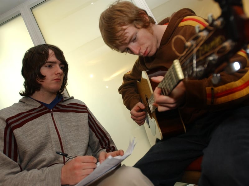 ADULT LEARNERS WEEK. . . .Rory Morrin, left, and Ryan O'Doherty take part in a songwriting workshop at the Verbal Arts Centre, part of the
activities organised by the Workers Education Association for Adult Learners Week. (1607PG19) Photo Phil Gamble