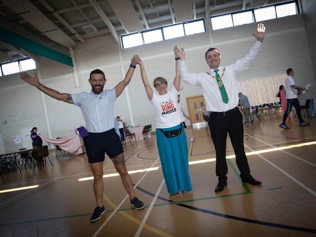 GREAT SUCCESS!. . . .Sinead Devine, DEEDS Co-Ordinator in celebration with Micky Doherty and Mayor, Ruairi McHugh after Tuesday's DEEDS Tea Party. (Photos: Jim McCafferty Photography) : .