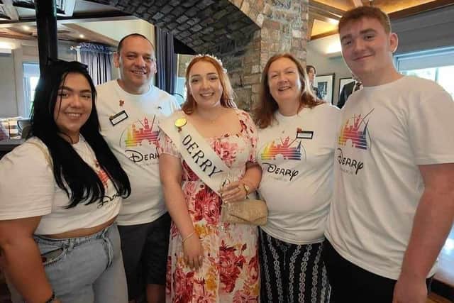 Aine with her family