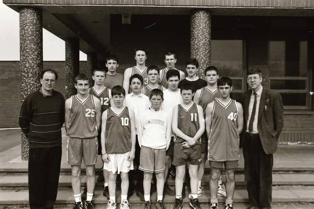 St Columb's College basketball team with staff.