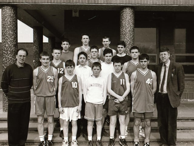 St Columb's College basketball team with staff.