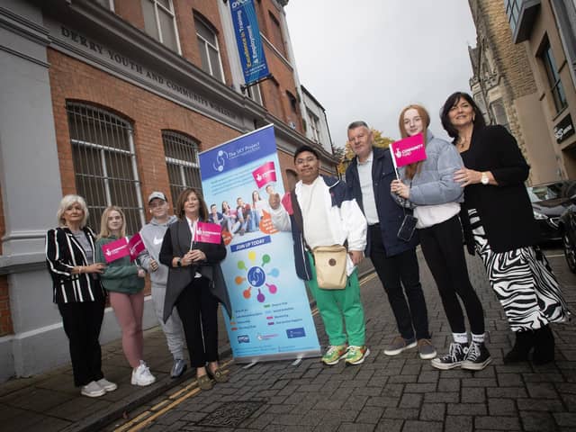 Some of the young people showing their support at last week's SKY Project Launch at the Derry Youth and Community Workshop premises in Society Street. Included are Eleanor Conaghan, SKY Project, Lisa Boggs and Tommy Carlin, National Lottery and Rosemary McKinney SKY project.