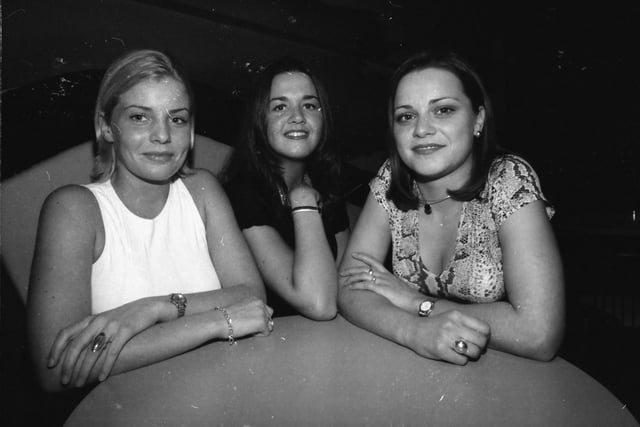 Donna Tierney (centre), promotion co-ordinator, with two of the finalists of the 'Morgan Spring Face '98', at Earth night club. On left is Kealey Curran and on right is Joanne Curry.
