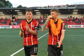 Derry City players Cameron McJanett and Jamie McGonigle leave the pitch after the game against Shelbourne.  Photo: George Sweeney. DER2321GS - 86