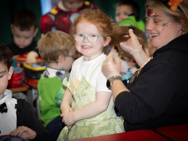 P1 pupil Aoife Moore pictured with Mrs. Feeney in the school's canteen on Friday. : .