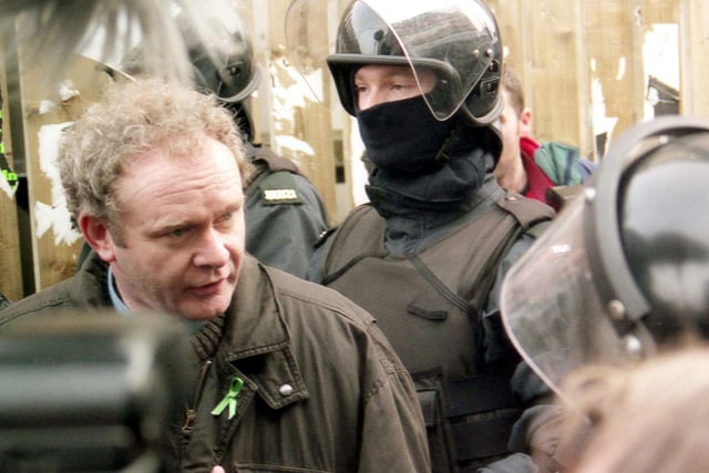 Martin McGuinness and RUC riot squad at Butcher Street, Derry.