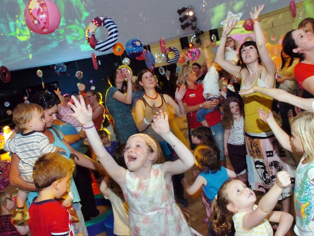 Children and parents take to the dance floor during the Tots Rock event in the Gasyard Centre. (0508PG19)
