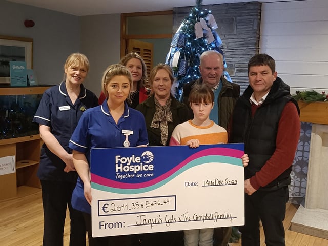 The Foyle Hospice have said 'thank you' to the lovely friends and family of Jacqui Campbell who raised an amazing €2011.35 and £476.49, proceeds of a Coffee Morning held in Jacqui’s memory at Quigley’s Point Community Centre. Jacqui’s Girls and the Campbell family are pictured here presenting a cheque to Foyle Hospice staff.