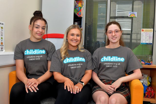 Staff members Ellen, Sydney and Sara pictured at the Childline Foyle open day, held in the Derry office, on Friday morning last. Photo: George Sweeney. DER2321GS - 40
