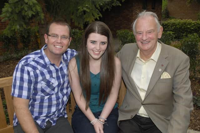 Three generations of the McGinley family, from left, Ciaran, Ciara and Dr. Tom McGinley, pictured at a garden open day and coffee morning at the Foyle Hospice. INLS3711-122KM