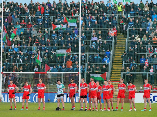 Derry players and Dublin fans stand for Amhrán na bhFiann Saturday’s game in Celtic Park. Photo: George Sweeney
