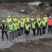 Mayor Patricia Logue with representatives of McKelvey Construction Ltd. (contractors), Gregory Architects, Derry City & Strabane District Council officers, and stakeholders, at the commencement of work for the Daisyfield Sports Hub. (Photo - Tom Heaney, nwpresspics)