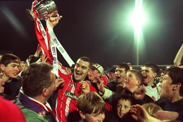 Sean Hargan pictured lifting the league trophy at Brandywell back in 1997.