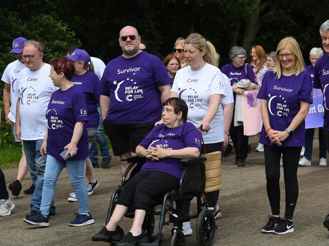 Almost one hundred cancer survivors took part in an inspiring Lap of Honour around St Columb’s running track prior to 40 fund-raising teams beginning the opening laps of the  24 hour Legenderry Relay for Life.  Photo: George Sweeney.