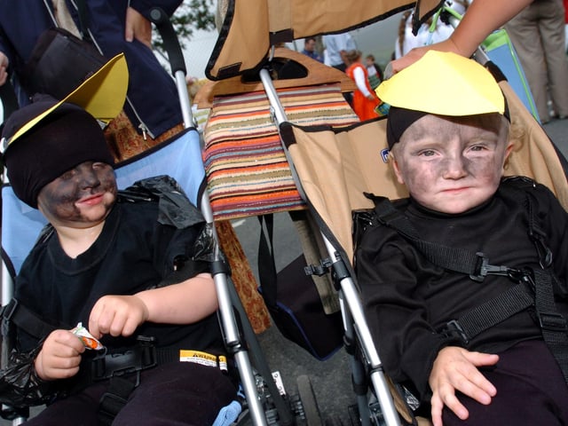 Harry Wilson and Conor McLaughlin dressed as blackbirds fot he Clonmany Festival parade. (0208A44) : Clonmany Festival, Vintage Show, Agricultural Show and Raft Race in August 2005.