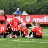 A half time pep talk for the Tristar Colts under-11's team at the Vale Centre.