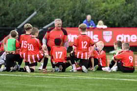 A half time pep talk for the Tristar Colts under-11's team at the Vale Centre.