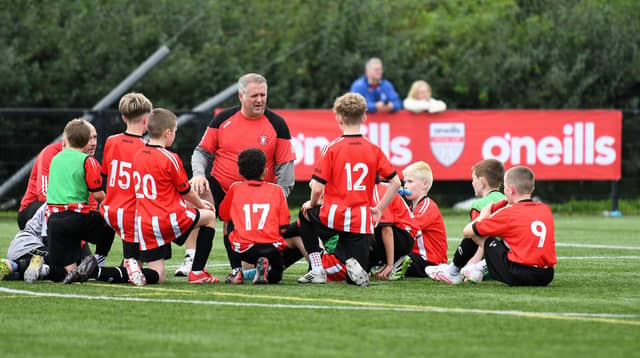 A half time pep talk for the Tristar Colts under-11's team at the Vale Centre.