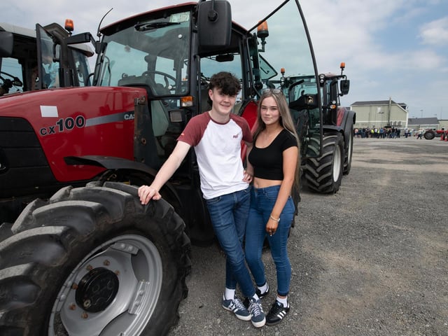Cillian Gallagher and Emma Kelly at the Allen Wylie Memorial Tractor Run from Letterkenny to Newtoncunningham on Saturday last held to raise funds for the Good & New Cancer Bus. Photo Clive Wasson