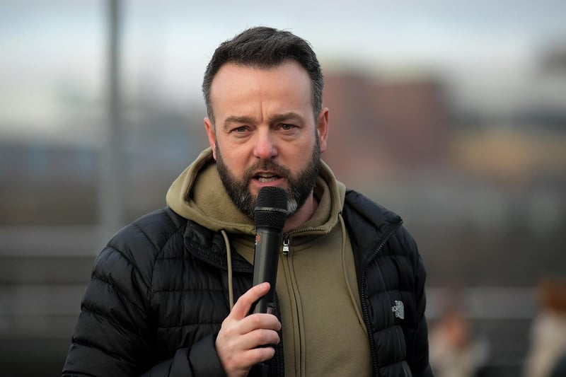Colum Eastwood MP speaking at the march and rally on Saturday afternoon, calling for a ceasefire in Gaza. Photo: George Sweeney
