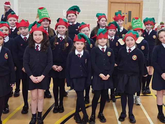 Pupils from Holy Child Primary School, Creggan, who performed at the Old Library Trust's DEEDS Christmas Concert in the Bishop's Field Centre, Creggan.