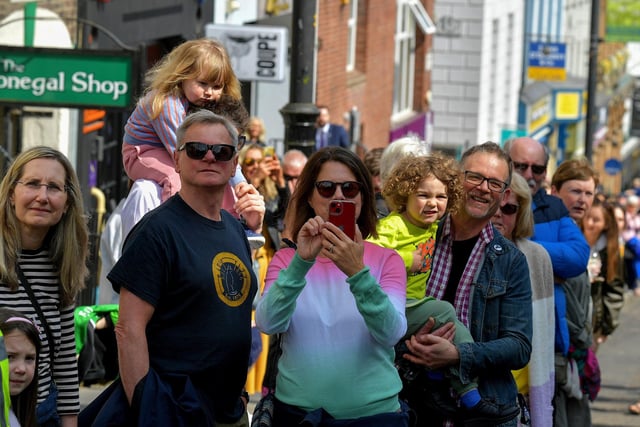 Spectators watch the Jazz Festival’s Second Line Parade make its way down Shipquay Street on Saturday afternoon.  Photo: George Sweeney.  DER2317GS – 138