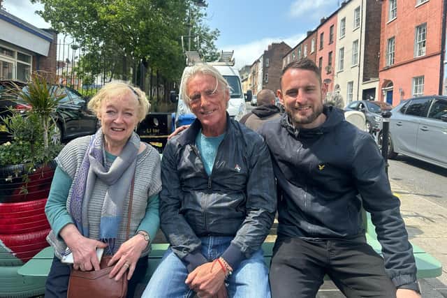 Paul Weller with Eamon Friel's widow Caitlín and his son Colum after stopping for a coffee at Jerusalem - Palestinian Bakery and Coffee House on Wednesday.