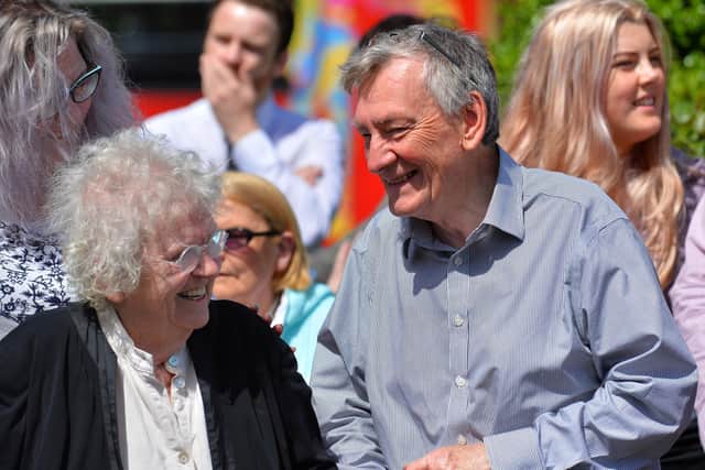 Nell McCafferty with Denis Bradley at the funeral of Ivan Cooper.