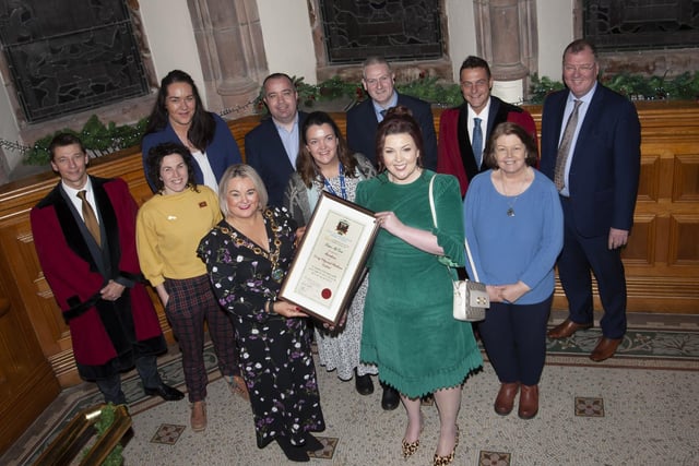 The Mayor, Sandra Duffy pictured with Lisa McGee, writer of Derry Girls and local Councillors and Council Officials at the Guildhall on Monday after receiving the Freedom of the City award - the first female to do so.