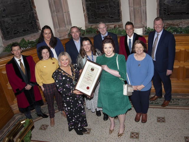 The Mayor, Sandra Duffy pictured with Lisa McGee, writer of Derry Girls and local Councillors and Council Officials at the Guildhall on Monday after receiving the Freedom of the City award - the first female to do so.