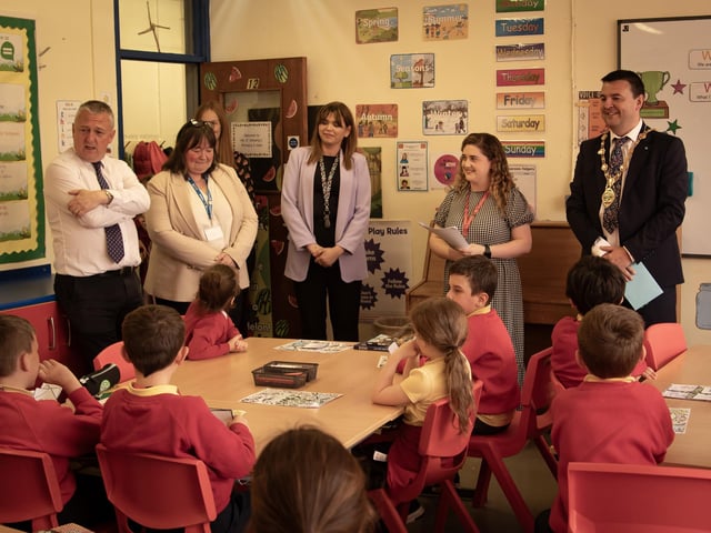 The Mayor and visitors pictured in Mrs. O'Doherty's classroom before taking part in Friday's event.