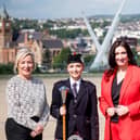 Pictured left to right are; First Minister Michelle O’Neill, Drum Major Jamie-Lee Wilson - Bready Ulster Scots Pipe Band and deputy First Minister Emma Little-Pengelly.