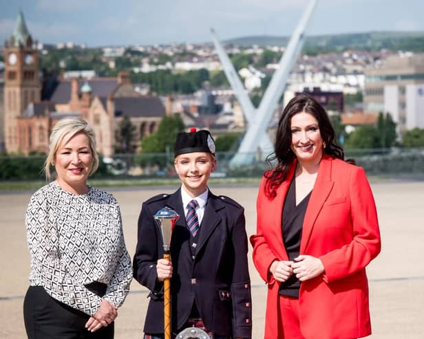 Pictured left to right are; First Minister Michelle O’Neill, Drum Major Jamie-Lee Wilson - Bready Ulster Scots Pipe Band and deputy First Minister Emma Little-Pengelly.