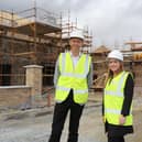 Jason Hardy, Head of Development and Katrina Smyth, Director of Development, Habinteg Housing Association, at the Beechmount Village site in Strabane.