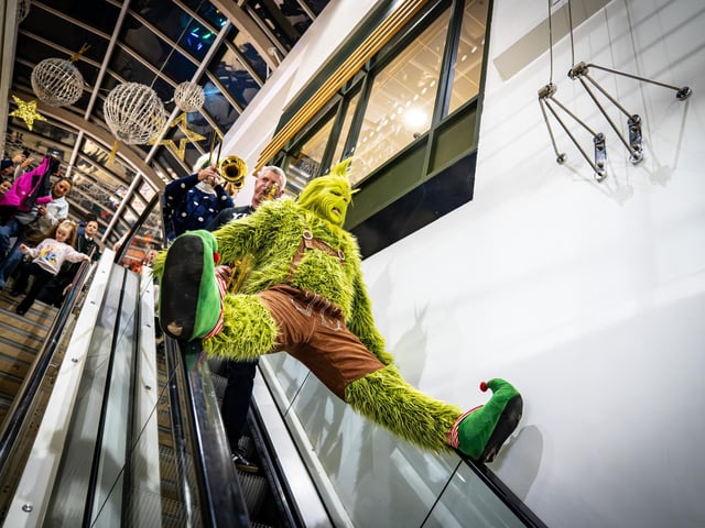 Derry, Northern Ireland. 7 November 2025. The Grinch makes a surprise entrance at Foyleside Shopping Centre, sparking laughter and excitement during the Christmas launch event. Credit: Aodhan Roberts. : Joyous scenes as Santa arrives at Foyleside Shopping Centre and the festive lights are turned on. Photos: Aodhán Roberts.
