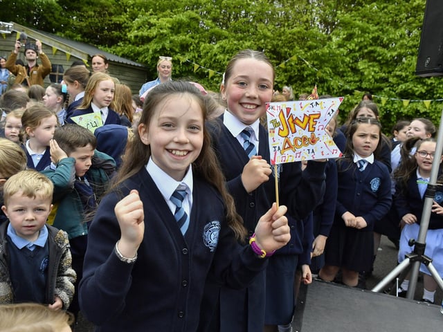 Happy pupils from Rosemount Primary School enjoy the entertainment from the Jive Aces on Thursday morning. Photo: George Sweeney