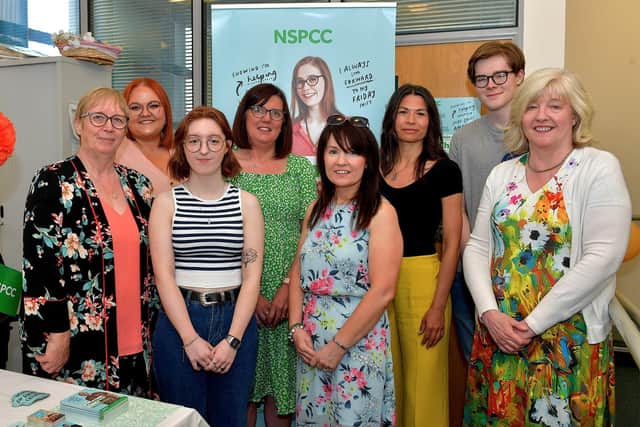 Volunteers pictured at the Childline Foyle open day, held in the Derry office earlier this year. Photo: George Sweeney. DER2321GS - 38