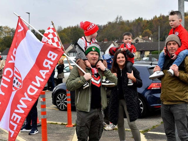 Derry City fans at the Brandywell Stadium on Saturday morning prior to the team’s departure for Dublin ahead of Sunday’s FAI Cup Final against Drogheda United. Photograph: George Sweeney