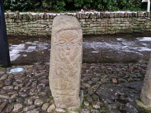 Stone pillar beside the 7th Century Carndonagh Cross in Donegal.