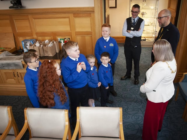 The children asking the Mayor, Sandra some questions on the history of the Guildhall during Monday’s visit.