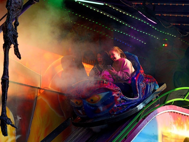 Girls enjoy the roller ghoster at Cullen's Halloween Funfair in Ebrington Square. Photo: George Sweeney.  DER2243GS – 059