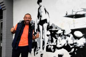 Micky Doherty pictured at the mural of Len Ball in Creggan’s Central Drive. Photo: George Sweeney.  DER2317GS – 40