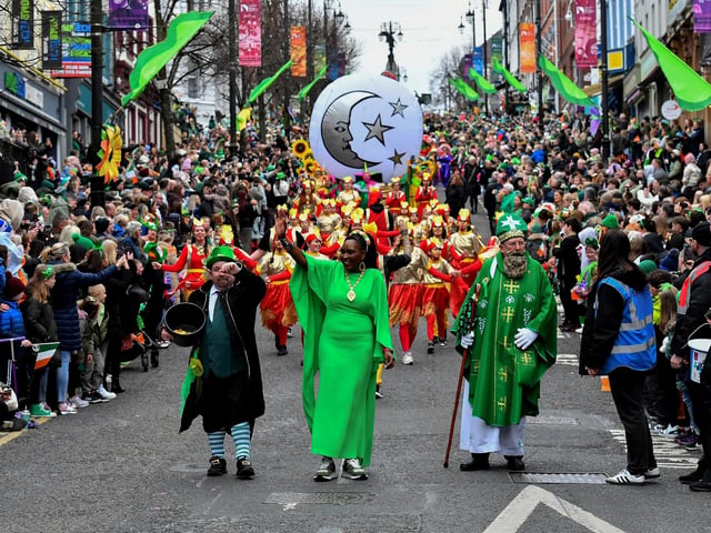 The Derry St Patrick’s Day parade makes its way towards the city centre on Monday afternoon. Photo: George Sweeney.