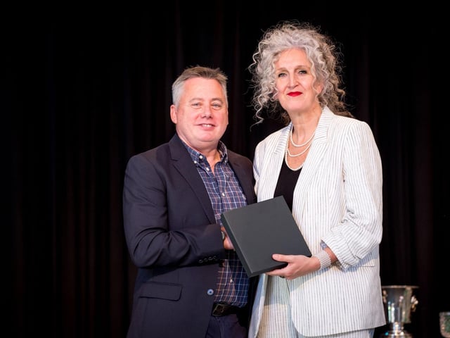 Mr Sean Carlin (Apex Housing Association) presented with the Thornhill in the Community Award by Ms Sharon Mallett (Principal).