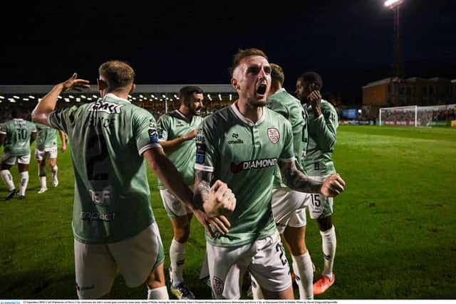 Carl Winchester celebrates his side's second goal scored by team mate Adam O'Reilly.
