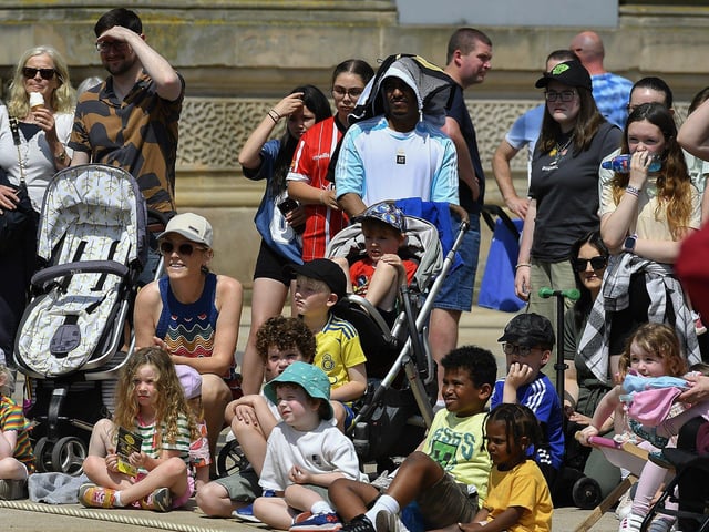 Spectators at an IYSC Youth Circus performance in Guildhall Square during the Carnival of Colours Festival. Photo: George Sweeney