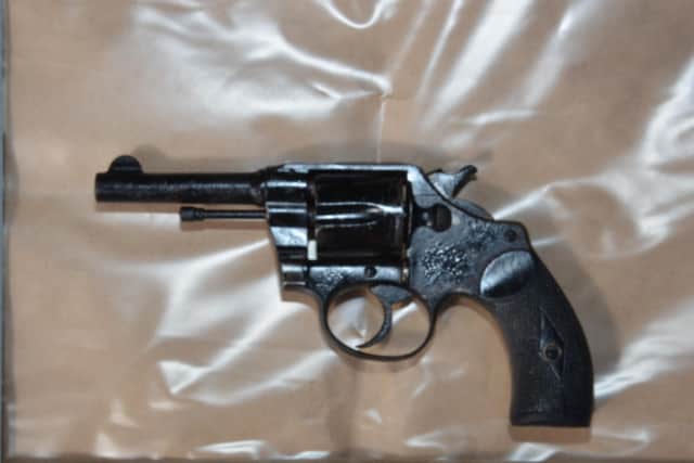 The suspected firearm recovered during the operation.