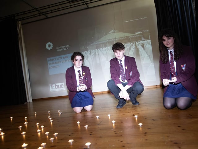 Foyle College students Molly McCurry, Kaelan Doherty and Emer Hughes pictured remembering Holocaust Day at last week's event.